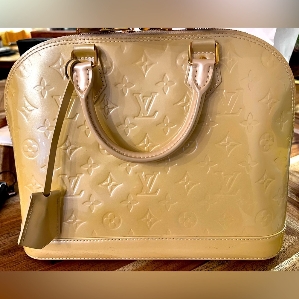 Louis Vuitton Alma PM- 12.6 x 9.8 x 6.3 inches
